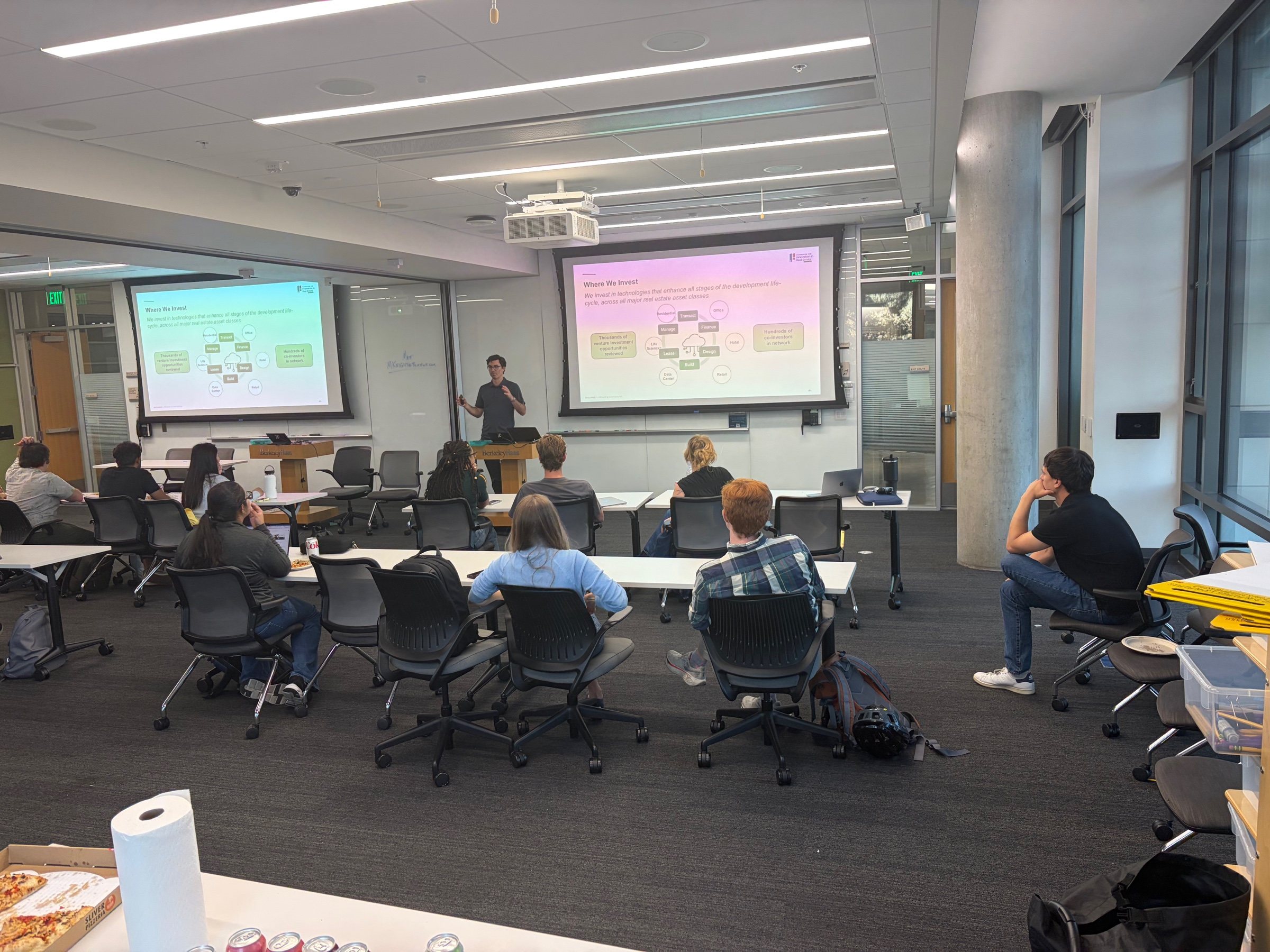 A guest speaker discussing real estate investment themes with Berkeley Haas students