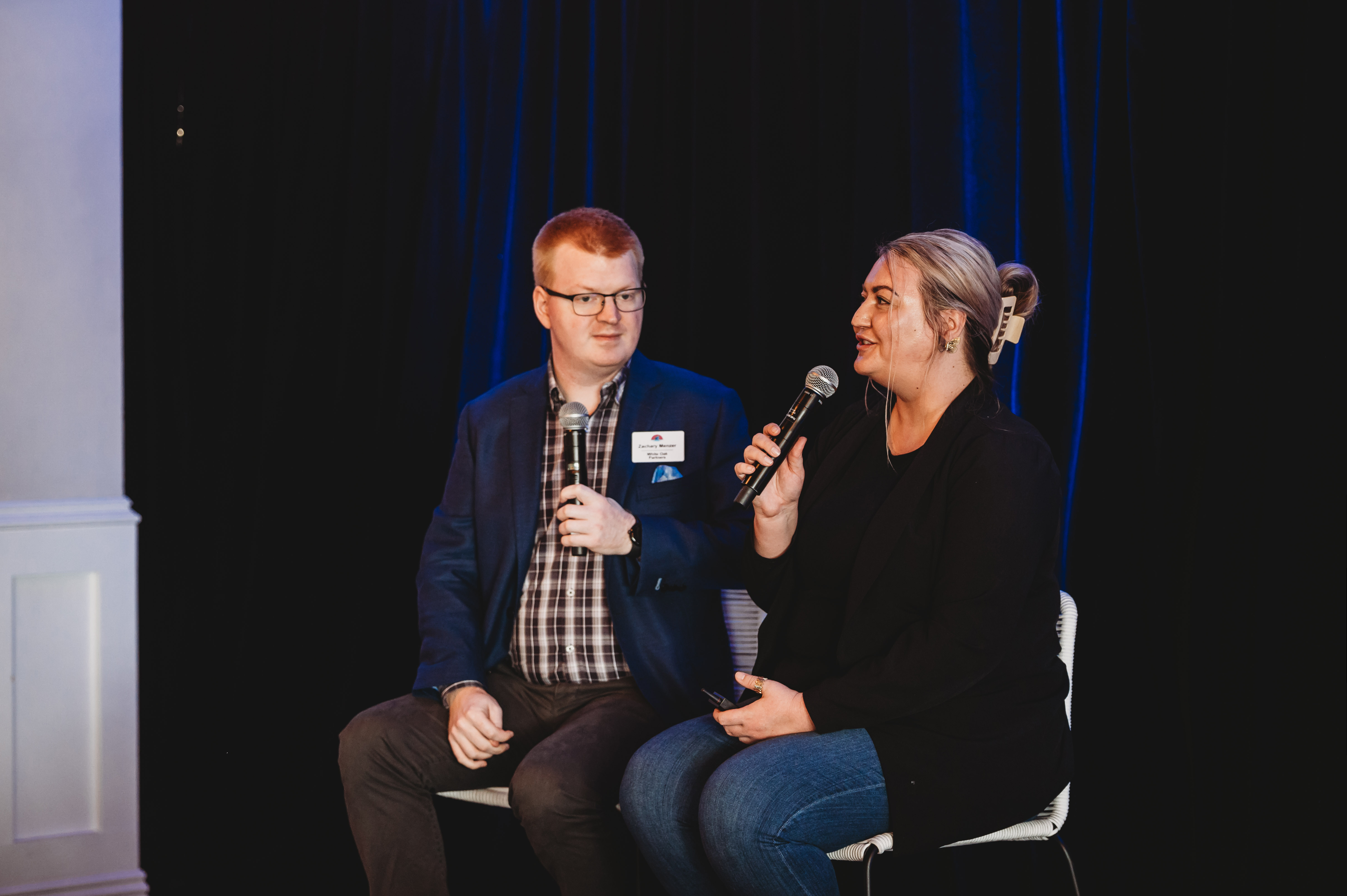 Stephanie speaking with Zac during an EMTC event