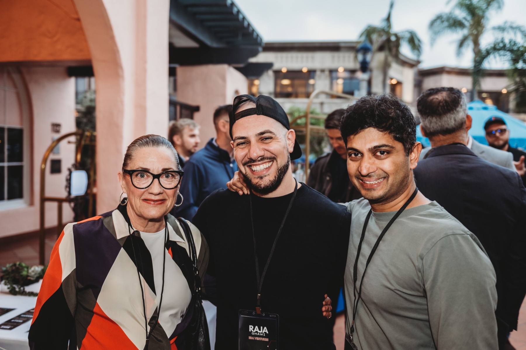 Three FIRE Summit 2025 attendees together at a reception