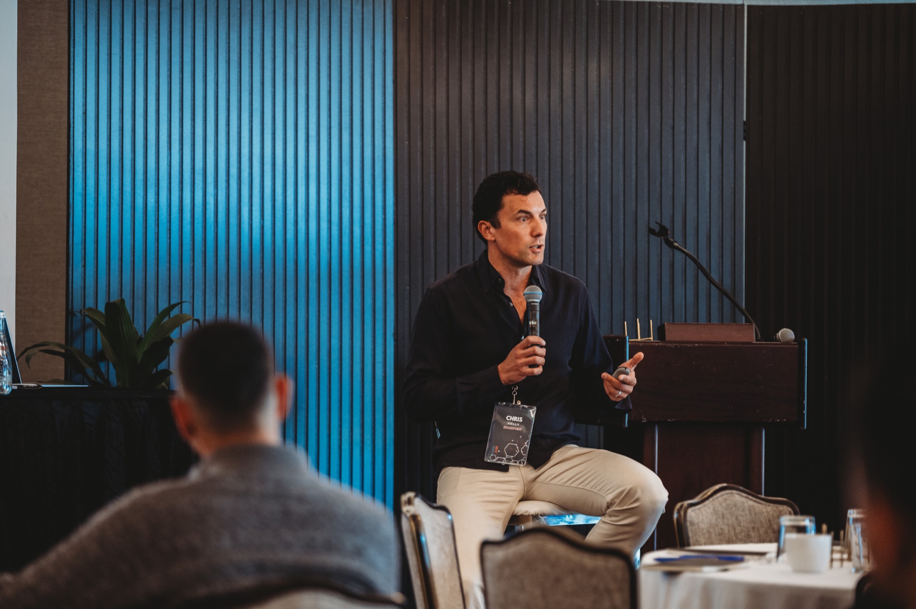 A FIRE Summit 2025 speaker sharing an idea with the room