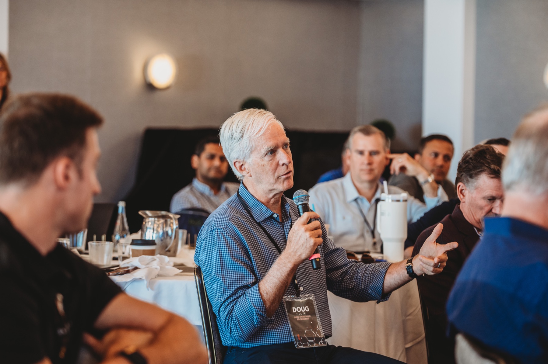 A FIRE Summit 2025 attendee contributing to the conversation