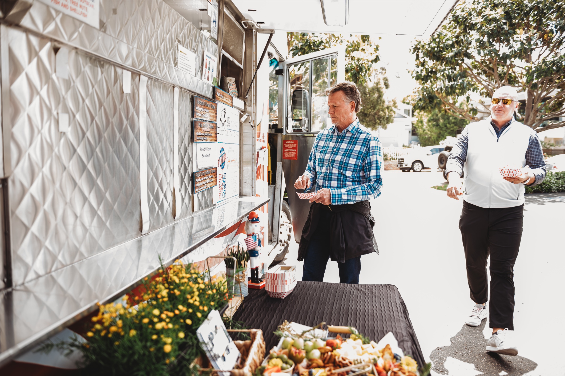 FIRE Summit 2026 attendees choosing lunch at a food truck