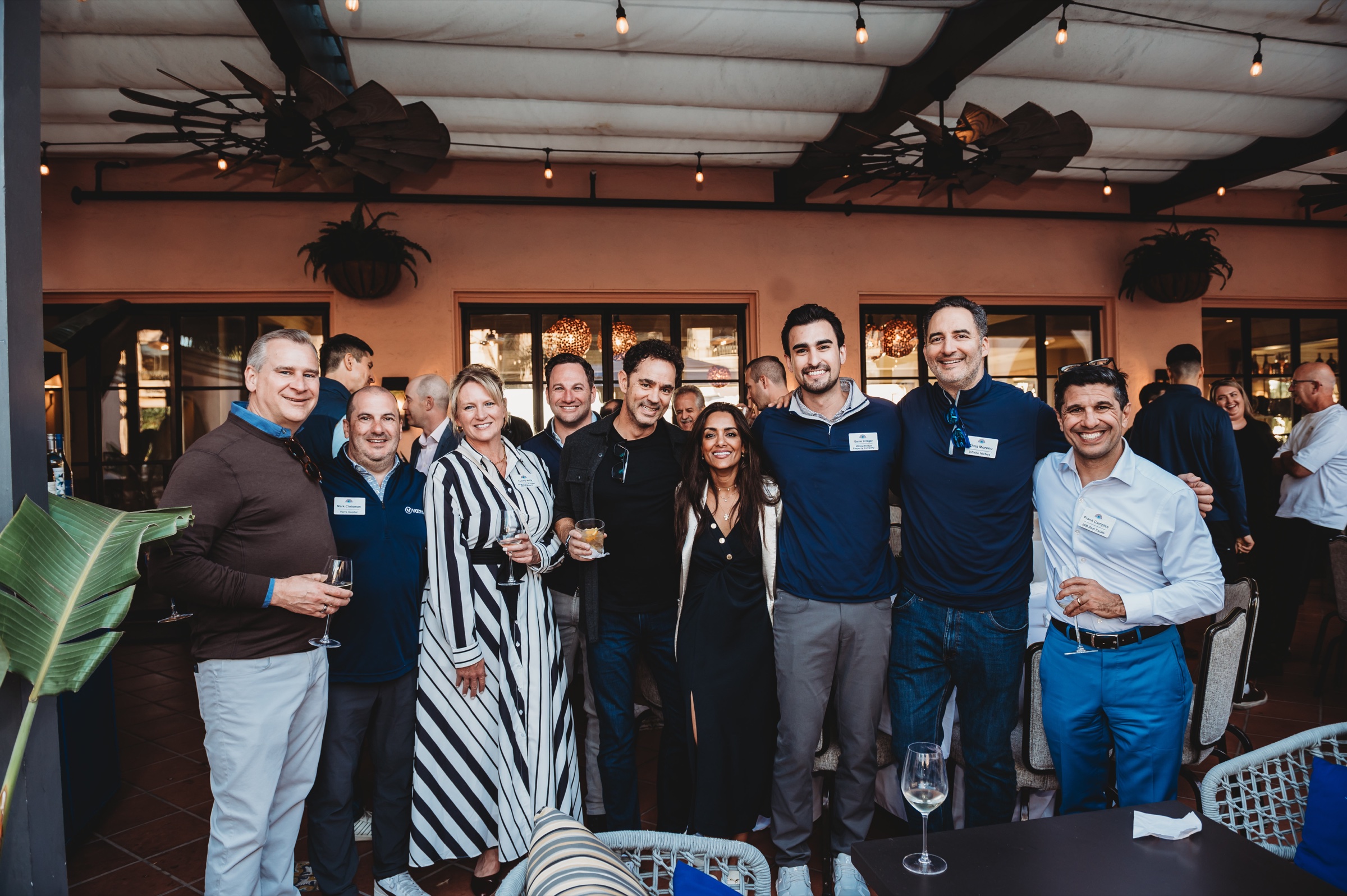 FIRE Summit 2026 attendees posing together at a La Valencia reception