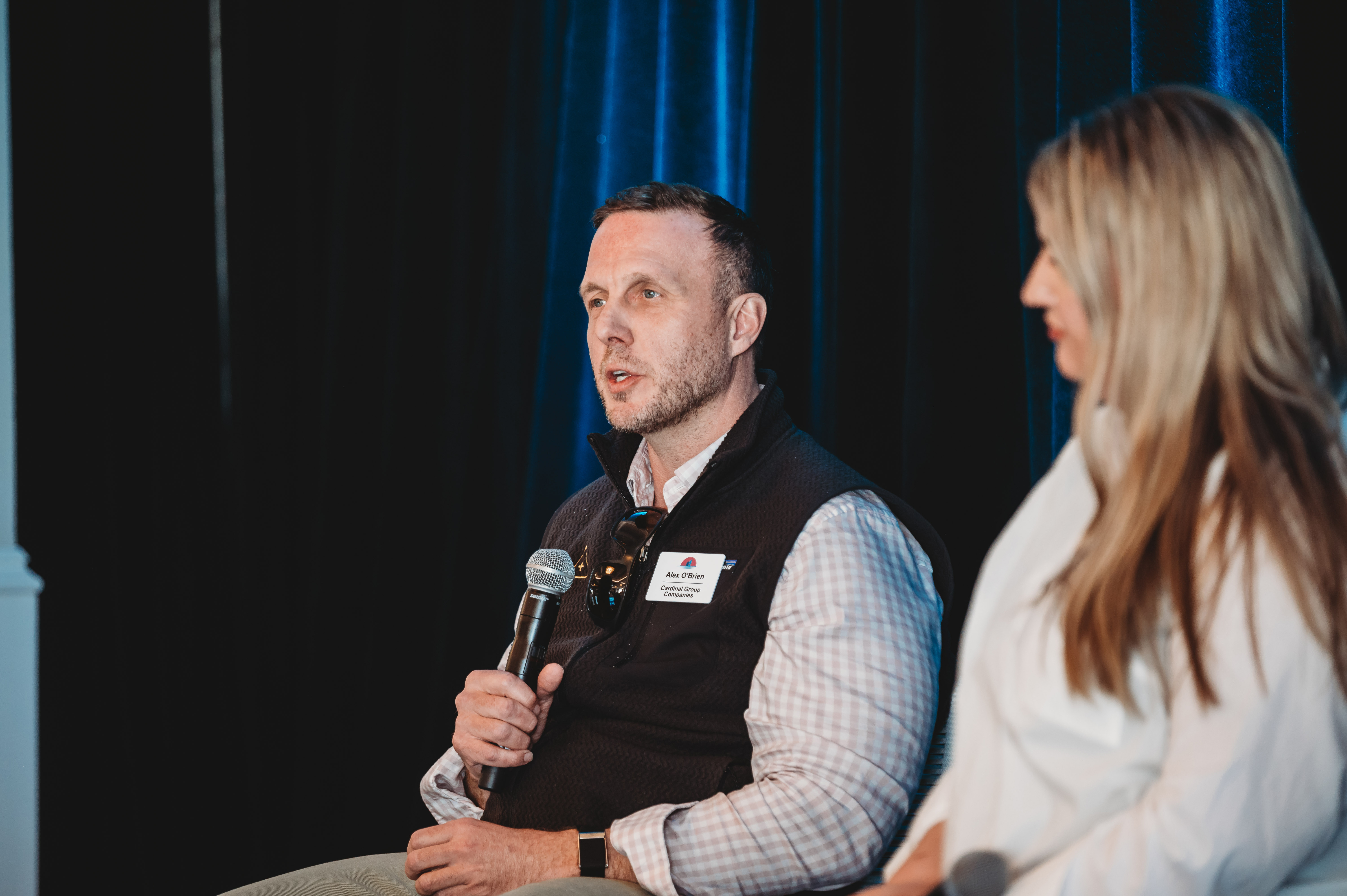 Alex O'Brien speaking during a FIRE Summit 2026 panel