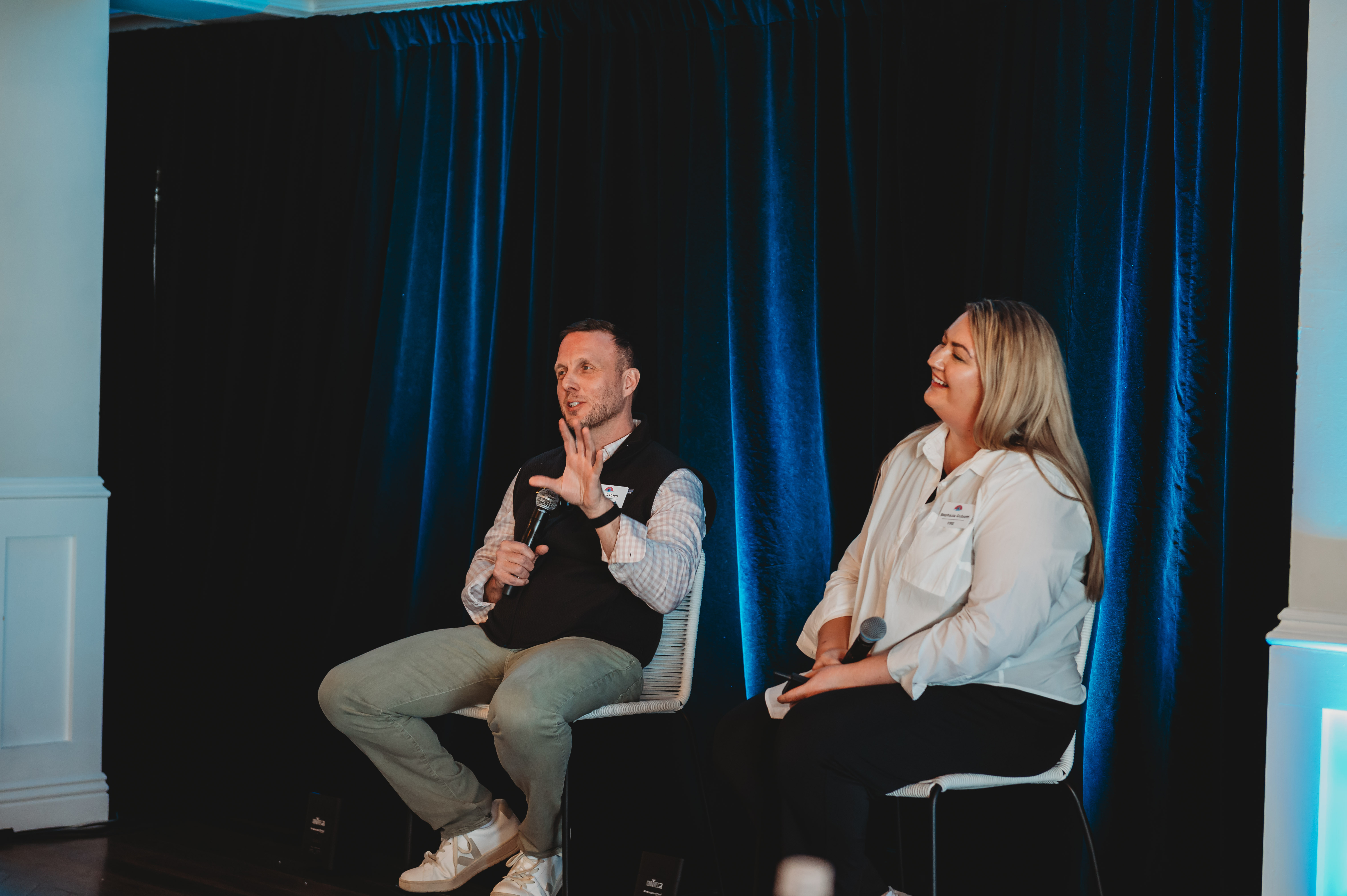 Two FIRE Summit 2026 speakers in an onstage conversation