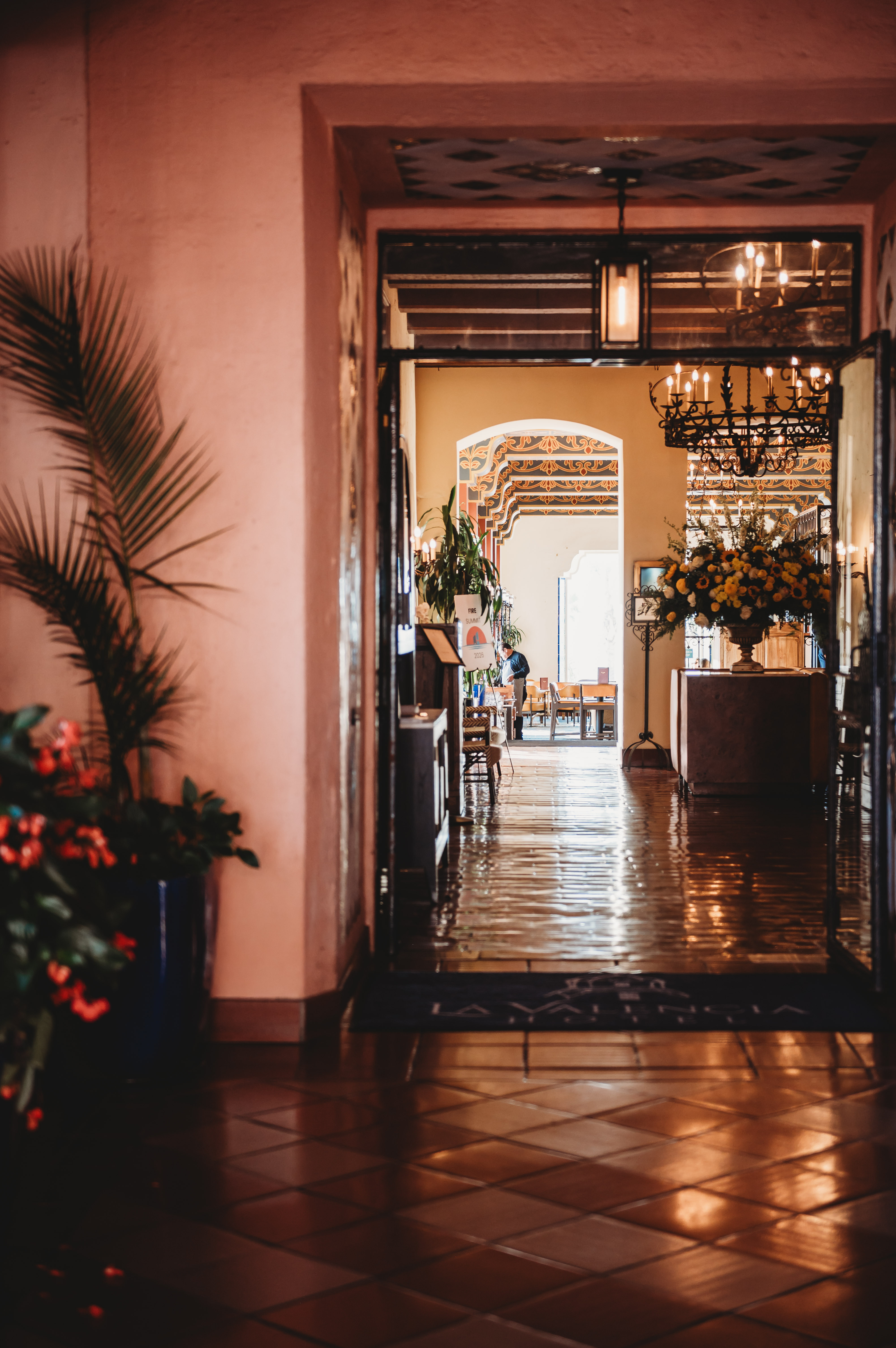 The La Valencia entrance hall and FIRE Summit 2026 welcome sign