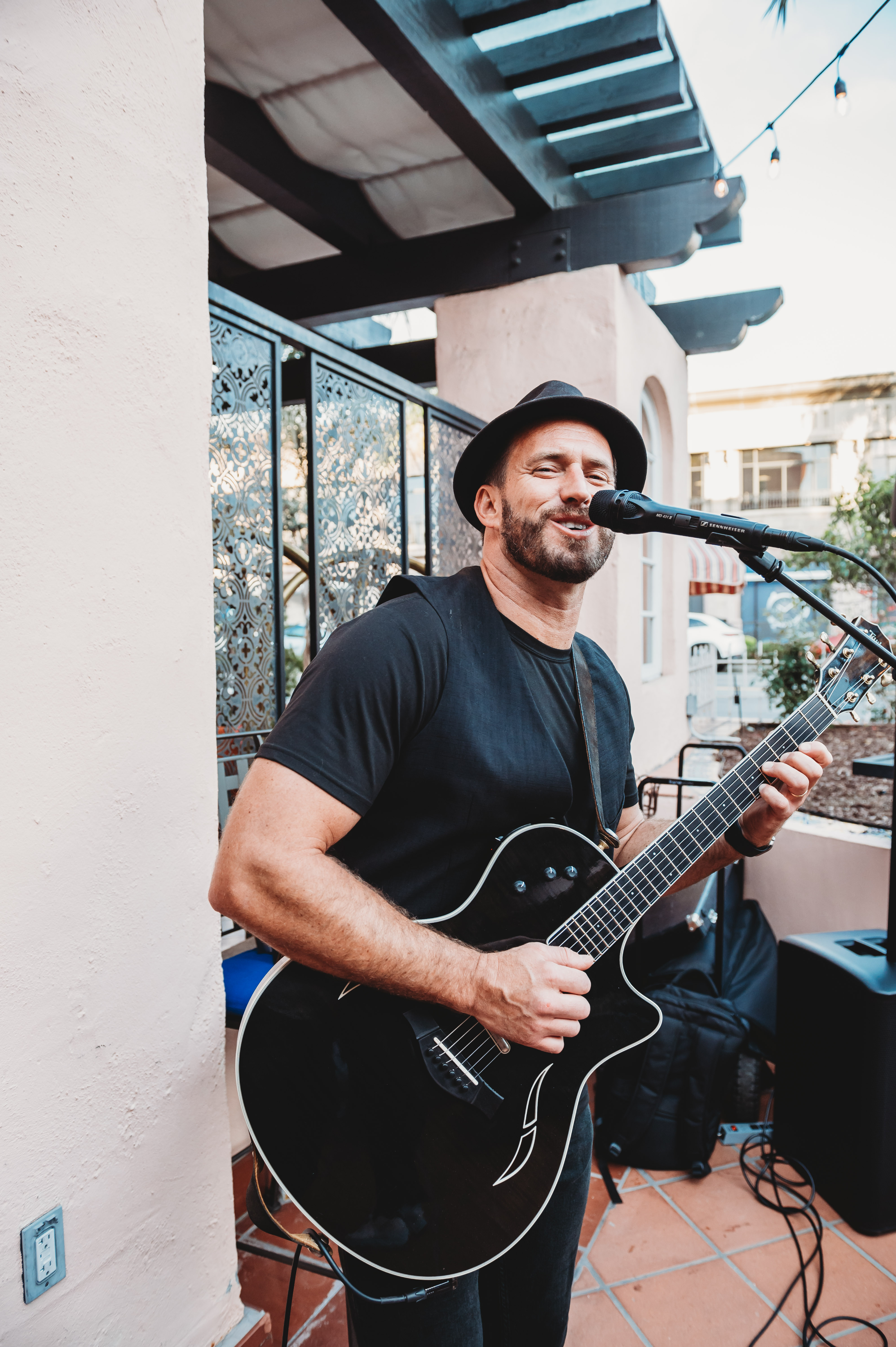 A musician performing during the FIRE Summit 2026 reception