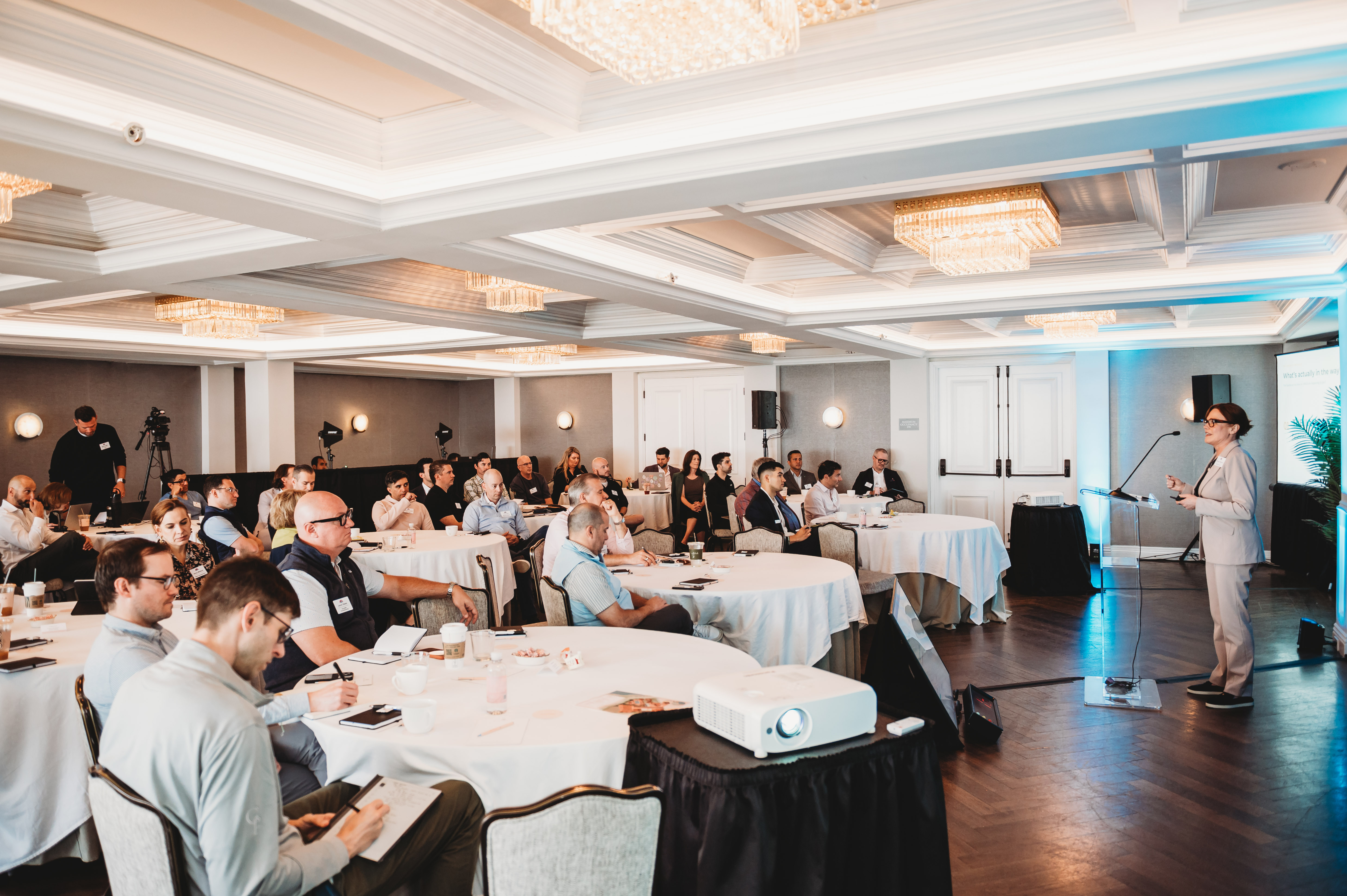 A FIRE Summit 2026 speaker presenting to a full room