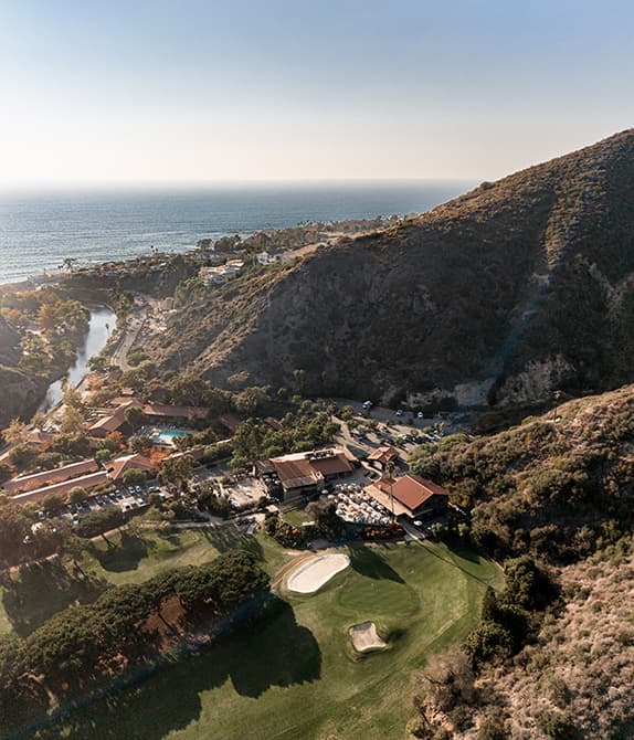 Aerial view of The Ranch at Laguna Beach between the canyon and the ocean