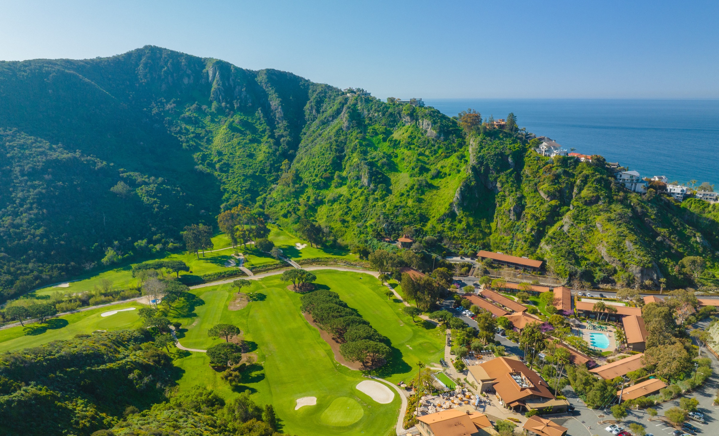 Aerial view of The Ranch at Laguna Beach, its golf course, canyon, and the Pacific Ocean